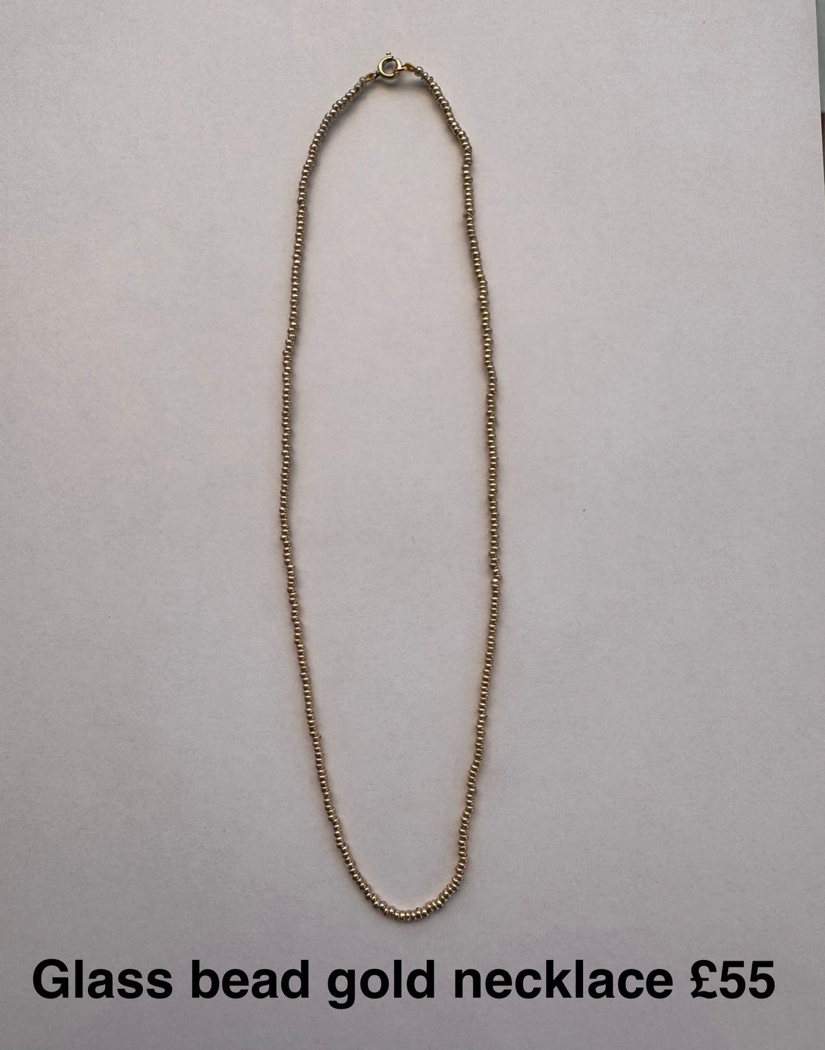 Glass bead necklace gold