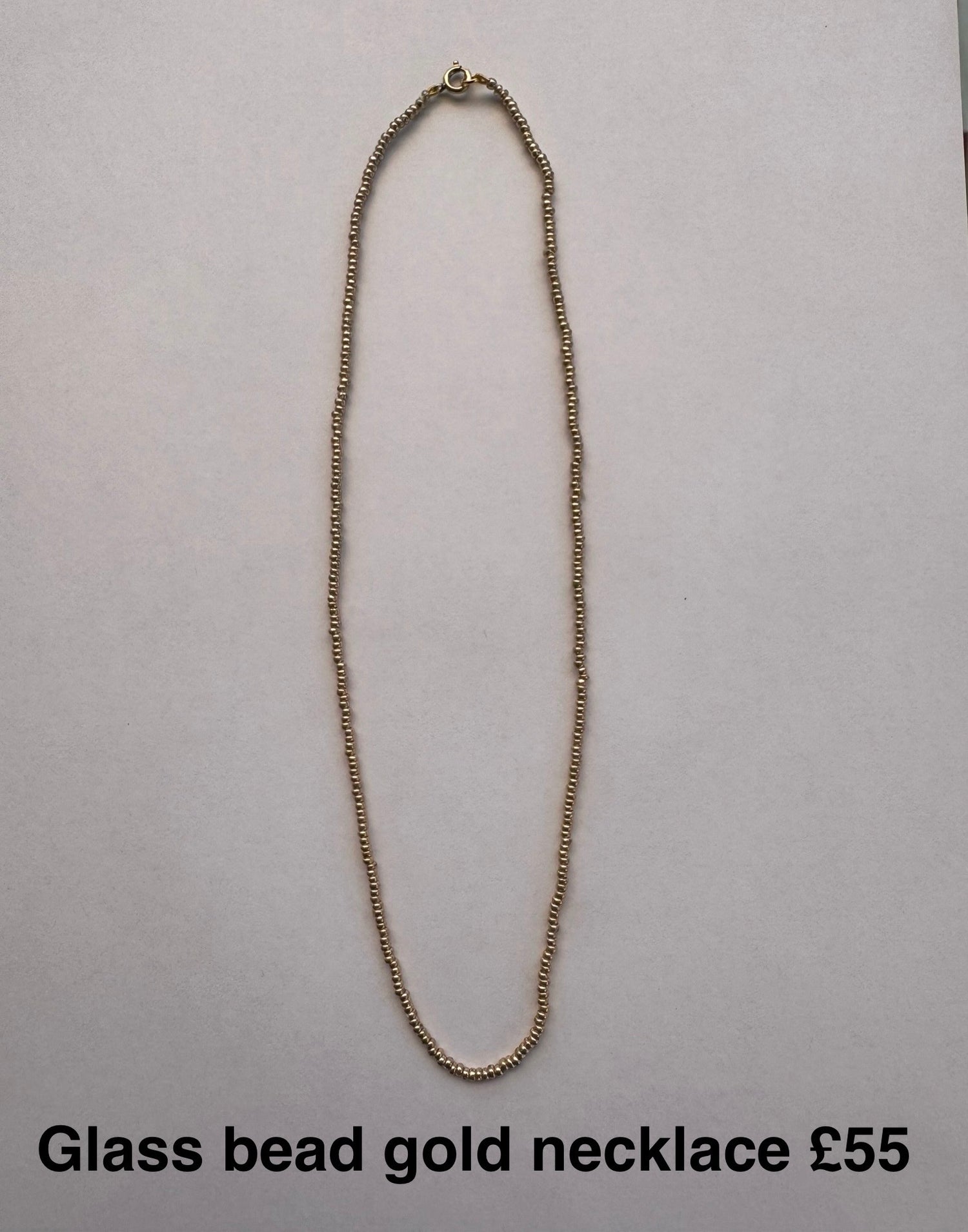 Glass bead necklace gold