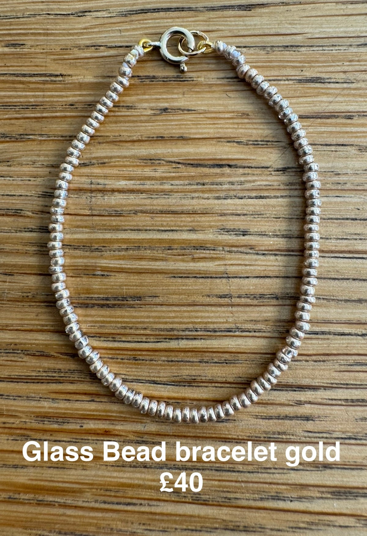 Glass bead bracelet pale gold