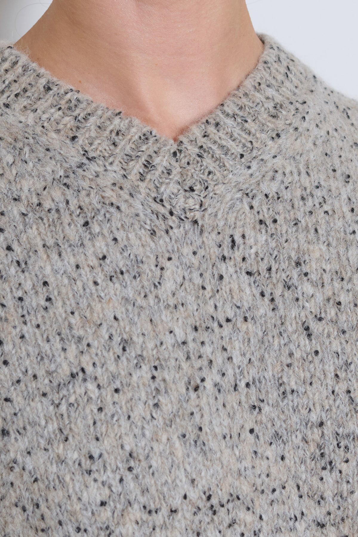 Cordera | Speckled V-Neck Sweater- Piedra